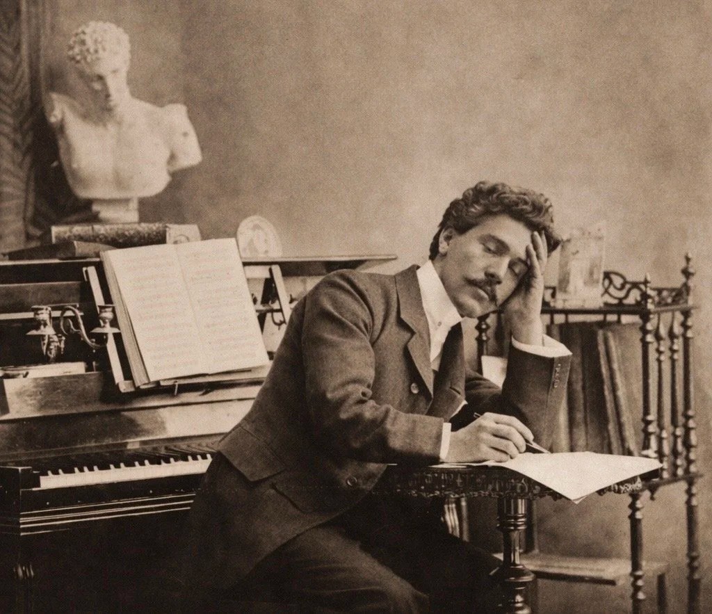 Young Albert Dupuis thinking, sepia photograph